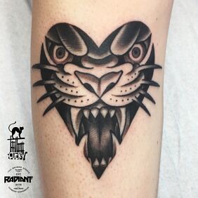 Tattoo Tiger heart on the leg motif: black and gray style: oldschool