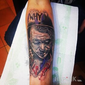 Tattoo Why so serious? on the forearm motif: faces