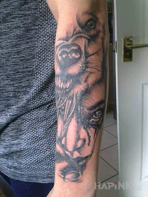 Tattoo Poczatek in faces motif and realistic style on the forearm
