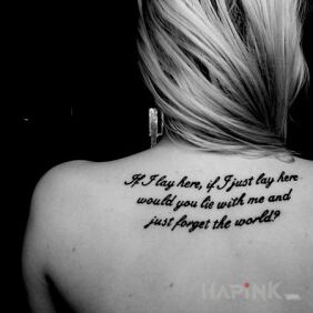 Tattoo Lie down with me on the back motif: lettering style: calligraphy