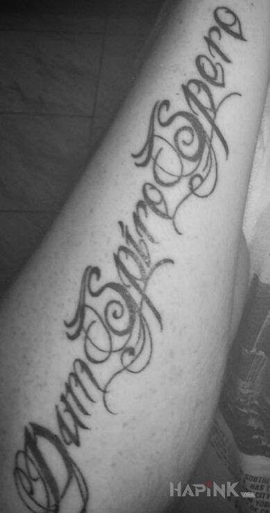 Tattoo Dum Spiro Spero in lettering motif on the forearm