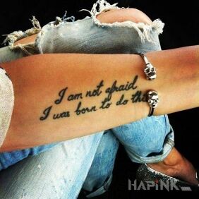 Tattoo No fear on the forearm motif: lettering style: calligraphy