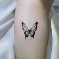 Wycena tatuażu - Wycena motyla połączonego z nożem sprężynowym