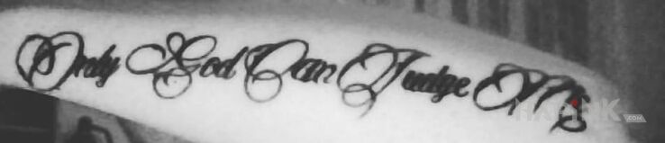 Tattoo Only God Can Judge Me in religious motif on the forearm