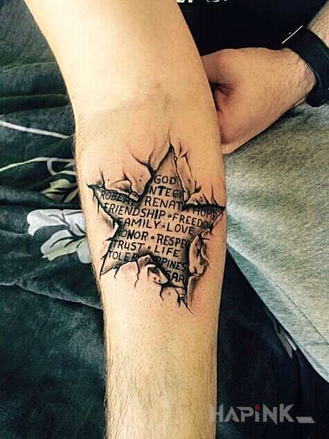 Tattoo Gwiazda in ripped skin motif and realistic style On the arm