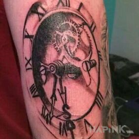 Tattoo Clock and gears On the arm motif: objects style: realistic