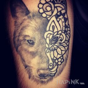 Tattoo Wolf on the forearm motif: animals