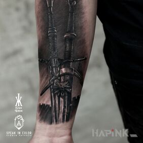 Tattoo The Witcher Theme On the arm motif: fantasy style: realistic