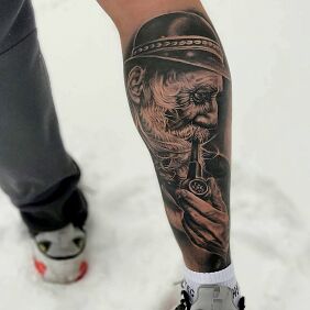 Tattoo Old Highlander on the calf motif: faces style: realistic