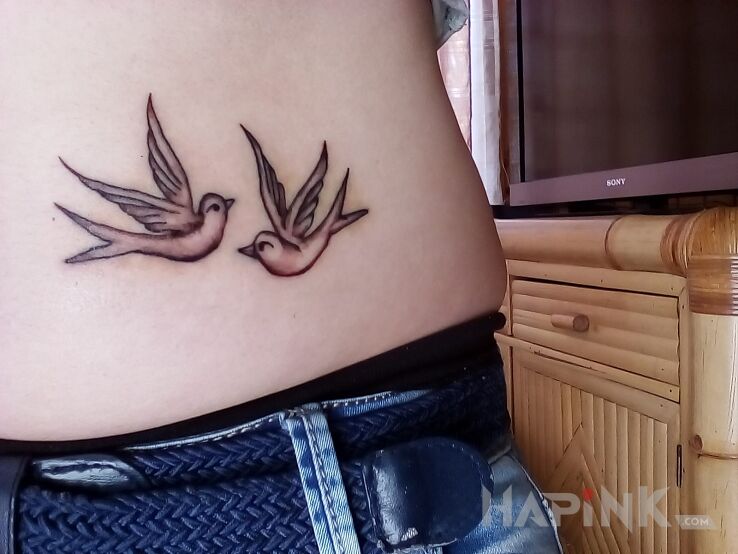 Tattoo Ptaki in animals motif on the stomach