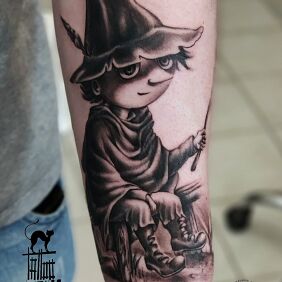 Tattoo Snufkin from the Moomins On the arm motif: black and gray style: graphic / illustrative