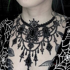 Tattoo Mega black necklace on the chest motif: objects style: blackwork / blackout
