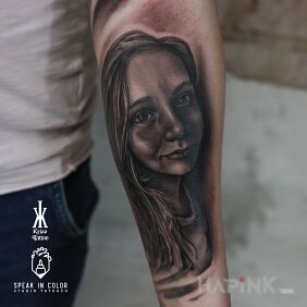 Tattoo Portrait of a Girl on the forearm motif: faces style: realistic