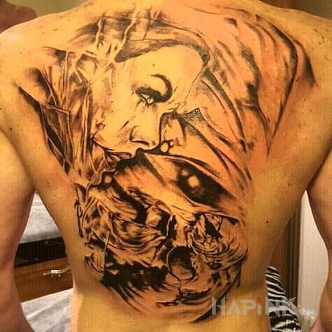 Tattoo Plecy in black and gray motif and realistic style on the back