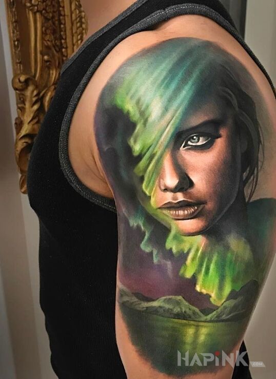 Tattoo Adriana Lima in 3D motif and realistic style on the upper arm