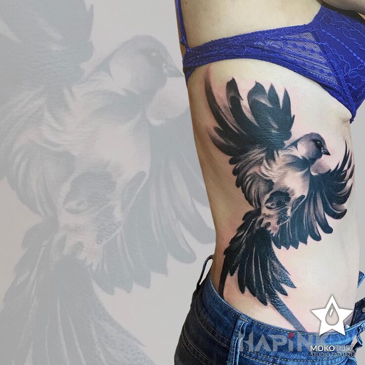 Tattoo Żebra nie bolą in skulls motif and realistic style on the ribs
