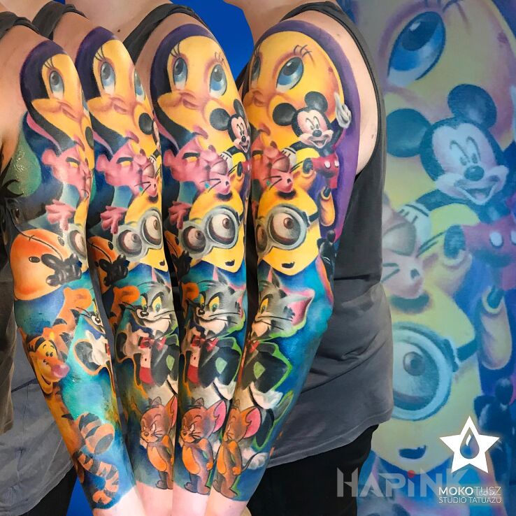 Tattoo Bajkowy rękaw in characters motif and cartoon / comic book style on the upper arm