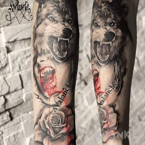 Tattoo Angry wolf on the forearm motif: animals