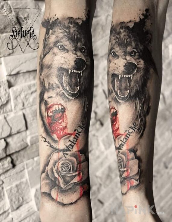 Tattoo Rozgniewany wilk in faces motif on the forearm