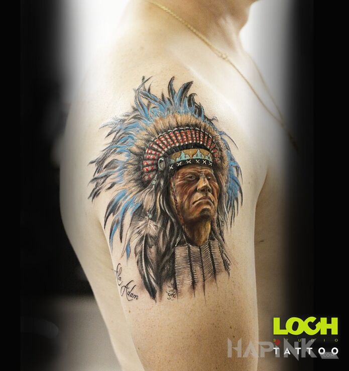 Tattoo Indjanin in Indian motif and realistic style On the arm