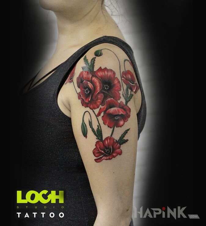 Tattoo Maki in flowers motif and realistic style On the arm
