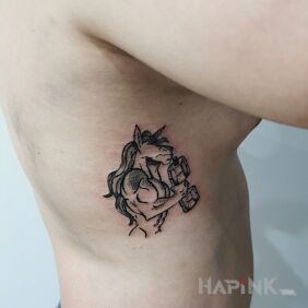 Tattoo Unicorn at the Gym on the ribs motif: fantasy style: dotwork