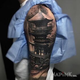 Tattoo Pagoda on the upper arm motif: sleeves style: realistic