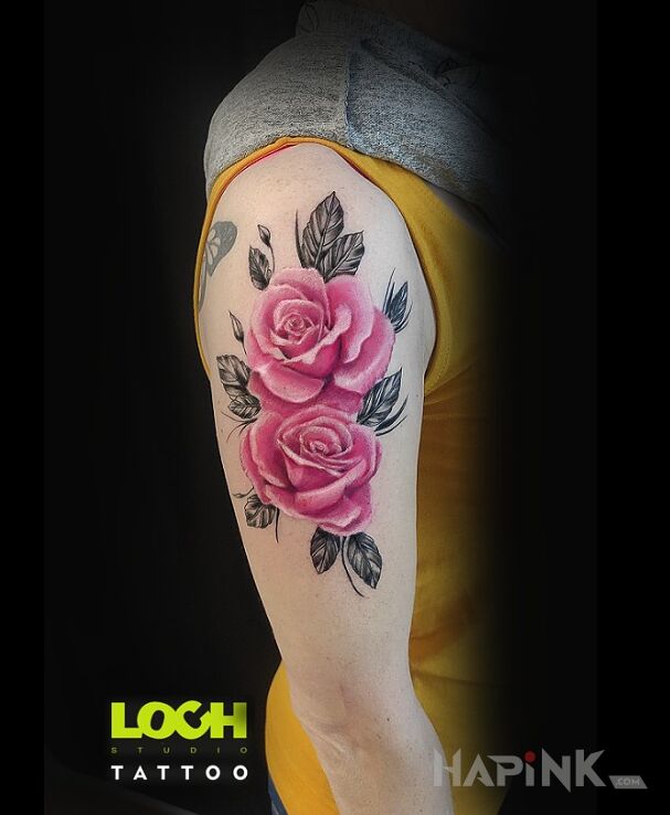 Tattoo Róże in colorful motif and realistic style On the arm