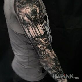 Tattoo Wolf in the forest on the forearm motif: animals style: realistic