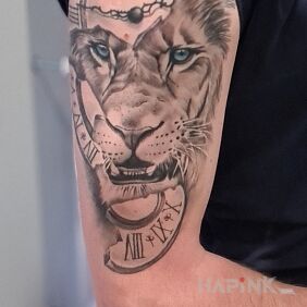 Tattoo Lion & clock On the arm motif: black and gray style: realistic