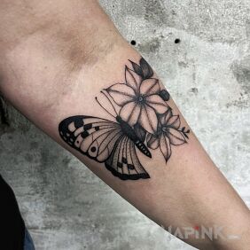 Tattoo Half Flower Half Butterfly On the arm motif: butterflies style: graphic / illustrative
