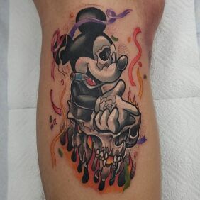 Tattoo Creepy Mickey on the calf motif: skulls style: newschool
