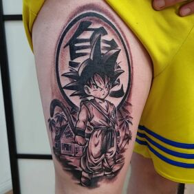 Tattoo Son Goku on the leg motif: black and gray style: graphic / illustrative