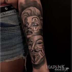 Tattoo Damian's masterpiece On the arm motif: faces style: realistic