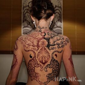 Tattoo Two tigers on the back motif: colorful style: graphic / illustrative