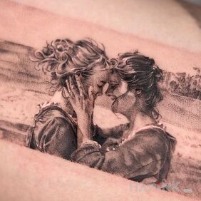 Tattoo Two women On the arm motif: black and gray style: realistic