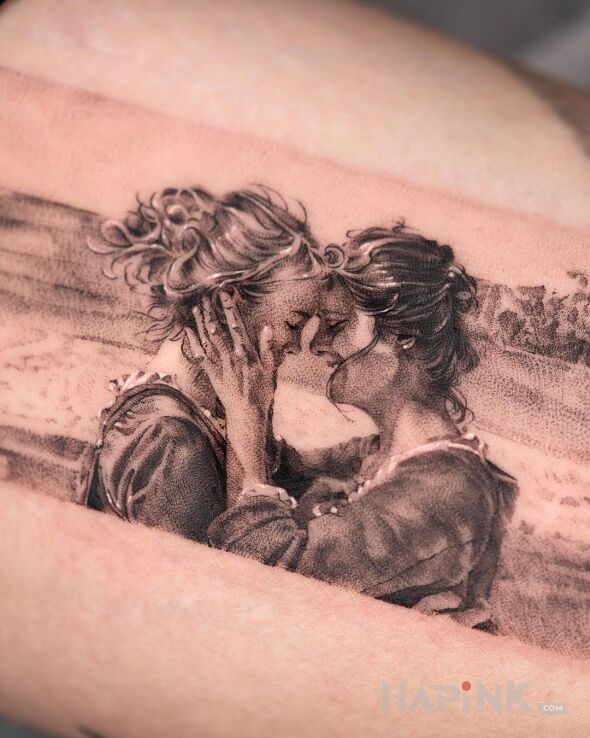 Tattoo Dwie kobiety in characters motif and realistic style on the bicep