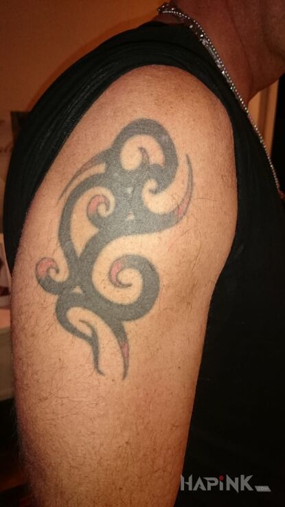 Tattoo Tak wyglądało przed  in tribal style on the upper arm