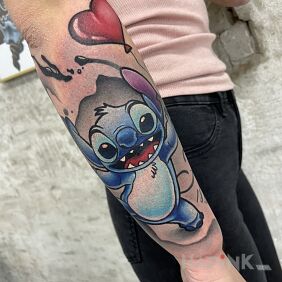 Tattoo Stitch on the forearm motif: characters style: cartoon / comic book