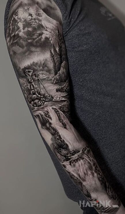 Tattoo Odpoczynek nad wodospadem in black and gray motif and realistic style On the arm