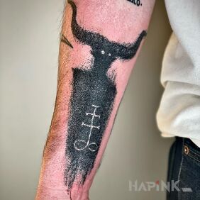 Tattoo Lucifer on the forearm motif: lettering style: dotwork