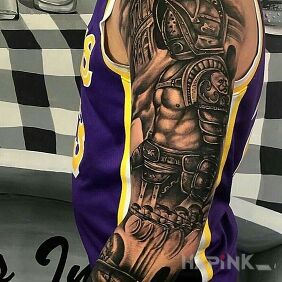 Tattoo Spartacus on the upper arm motif: sleeves style: realistic