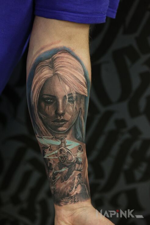 Tattoo Woman in fantasy motif and realistic style On the arm