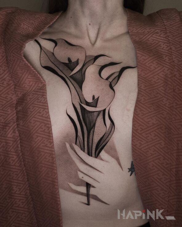 Tattoo Dwa abstrakcyjne kwiaty in black and gray motif and abstract style on the chest