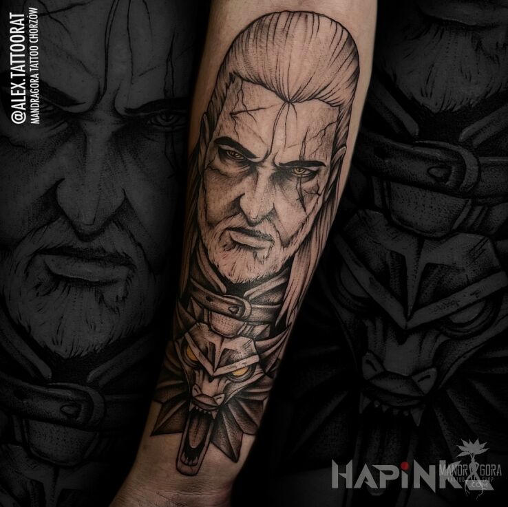 Tattoo Geralt Wiedźmin in black and gray motif and graphic / illustrative style On the arm