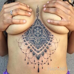 Tattoo Nice mandala on the stomach motif: sexy