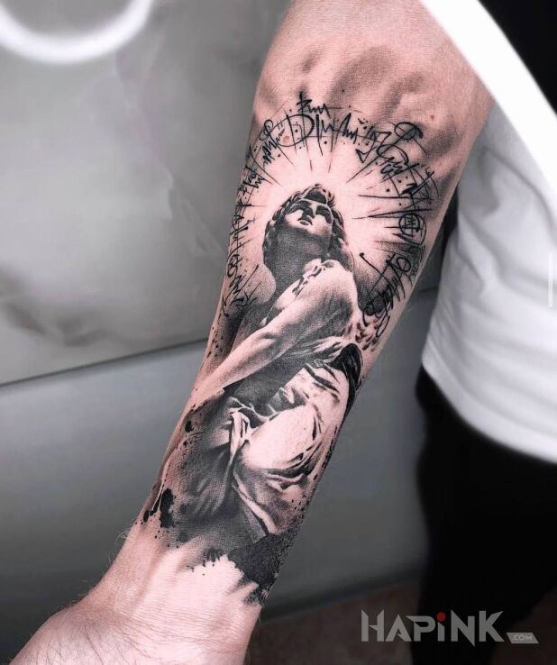 Tattoo W kręgu in black and gray motif and realistic style On the arm