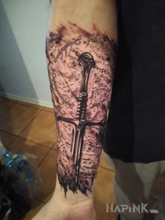 Tattoo Narsil in 3D motif and realistic style On the arm