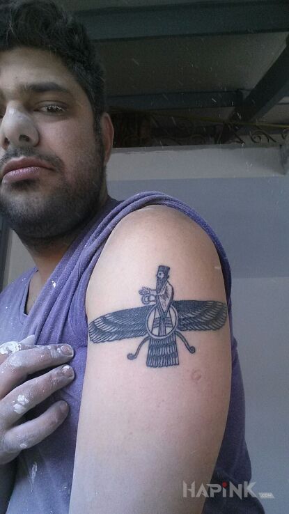 Tattoo Hinduski bóg wiatru;) in religious motif on the upper arm