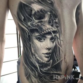 Tattoo The girl in the skull on the stomach motif: skulls style: realistic